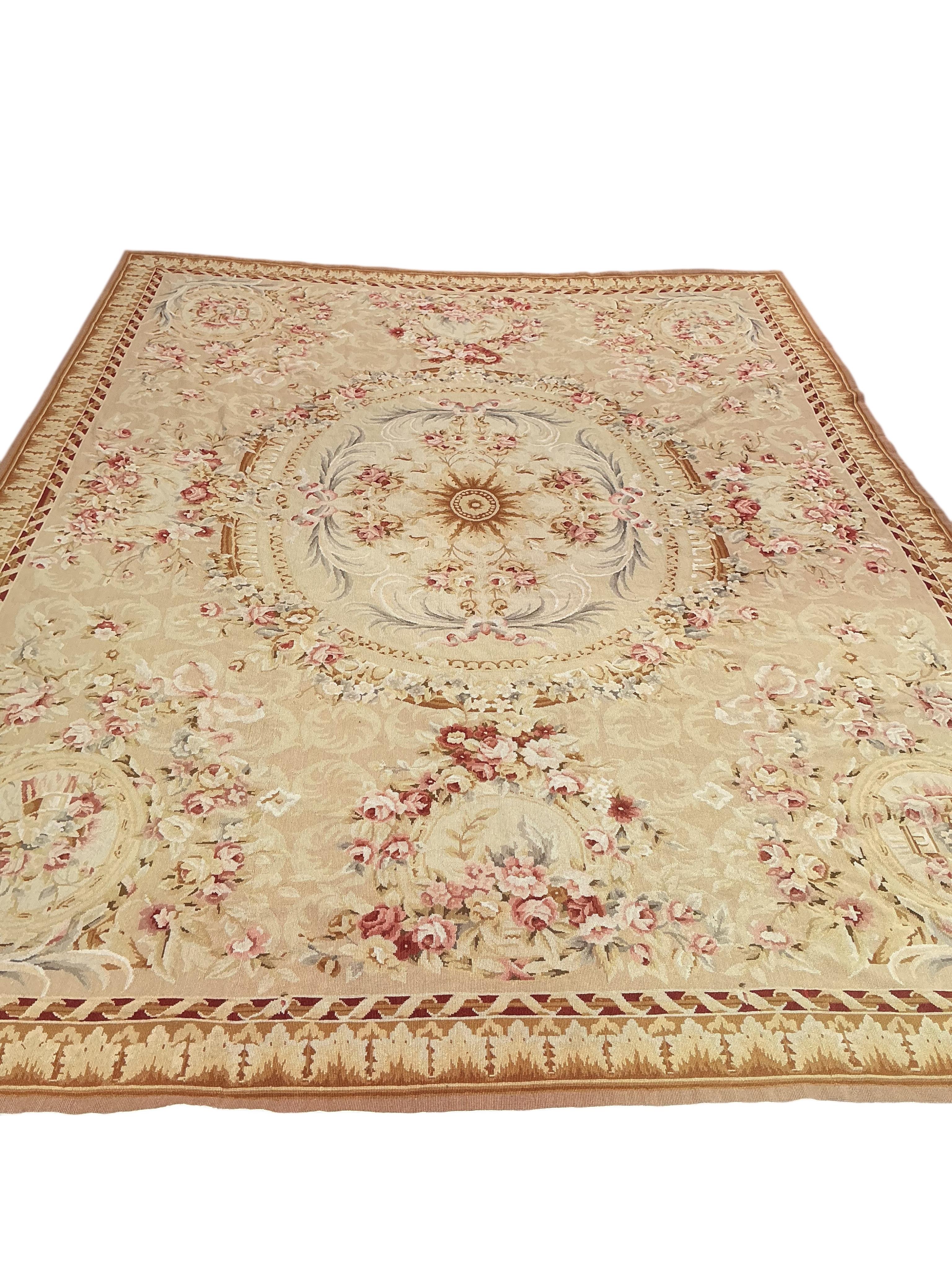 An Aubusson style carpet, 345 x 260cm